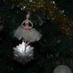 Depiction of the 9th day of Christmas with a lady dancing ornament